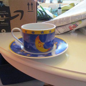 Vintage set of 8 sun and moon cups and  saucers made by Gibson